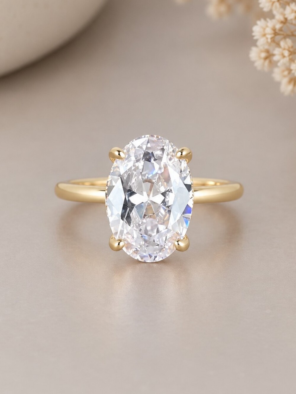 Classic Gold Oval Solitaire Ring with Clear Stone